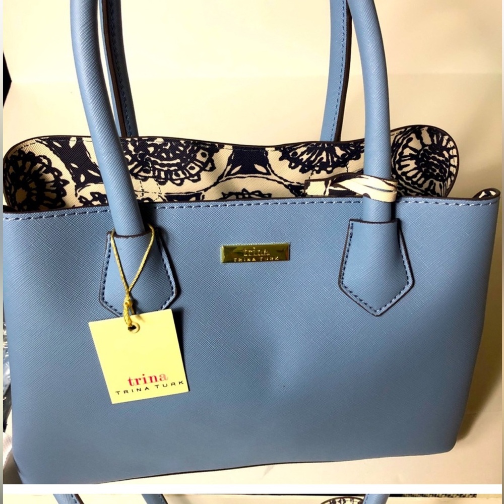 TRINA TURK NWT Blue handbag with shoulder strap, wallet, zipper compartments.